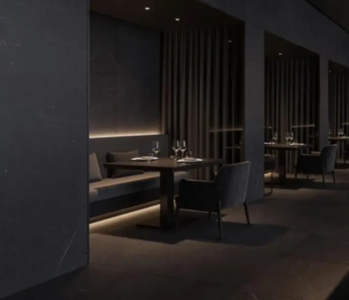 Modern, sötét tónusú bistro-lounge belső tér elegáns terítéssel